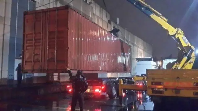 Storage container placed in a shopping mall car park the same day